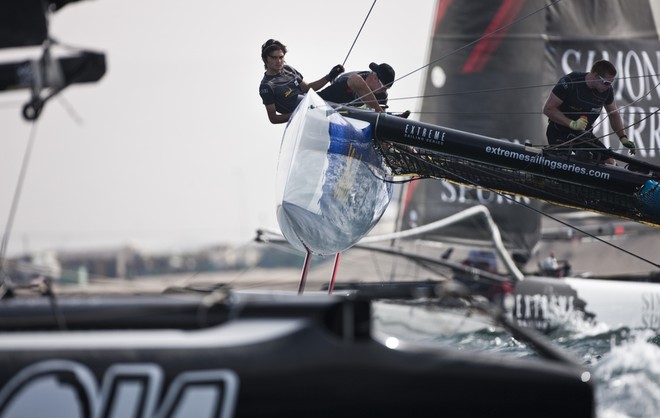 Day 3 - Red Bull Sailing Team in the thick of the action - Extreme Sailing Series 2012. Act 1 &copy; Lloyd Images http://lloydimagesgallery.photoshelter.com/